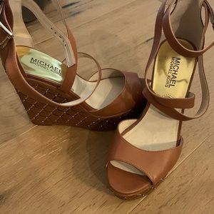 Micheal Kors brown wedge shoes.